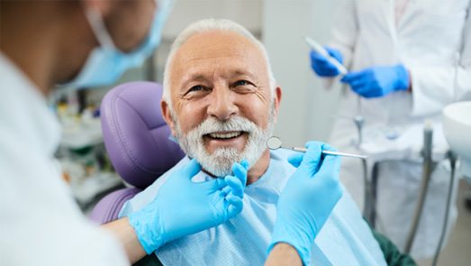 Man smiling in the dental chair