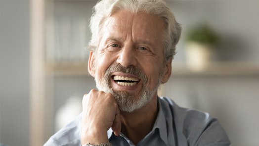 Man smiling with dentures