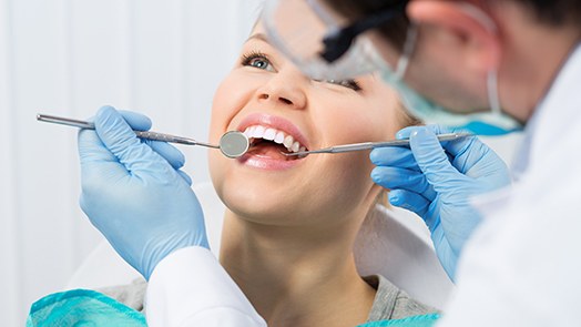 patient getting dental checkup 